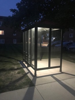 Bus stop lighted at night