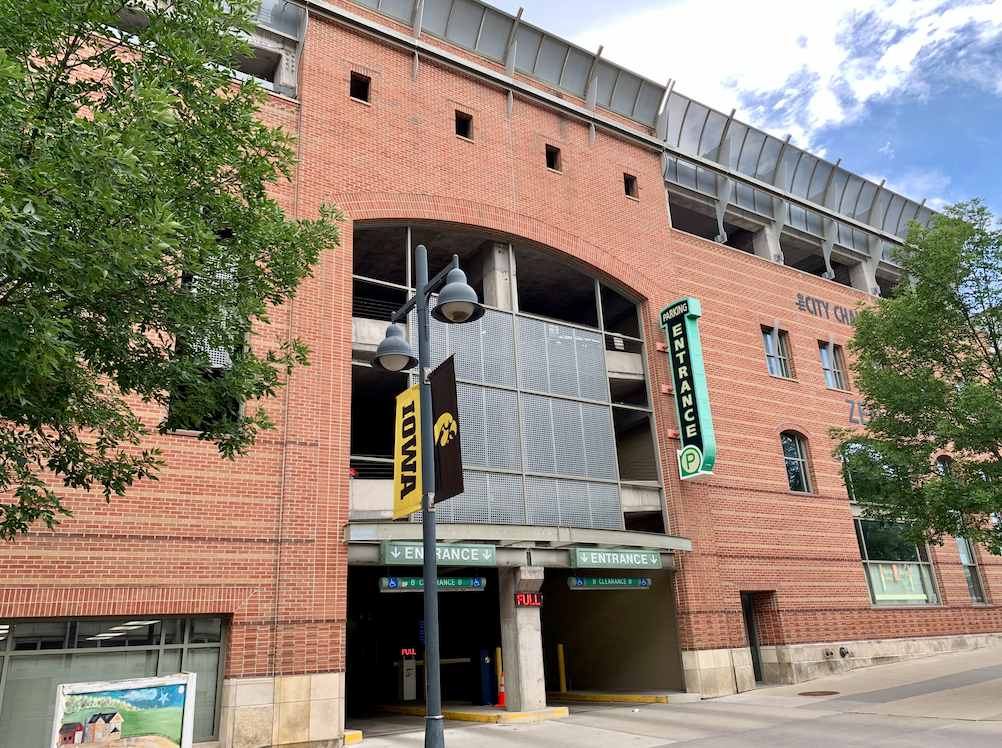 The Iowa Avenue entrance of Tower Place Parking Ramp is shown.  