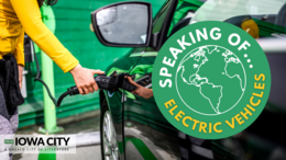 person plugging in electric car charger, green logo reads "Speaking Of...Electric Vehicles"