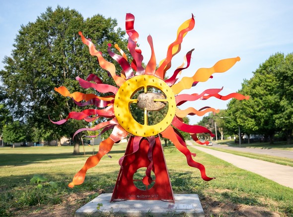 An image of sun sculpture is shown in Iowa City. 