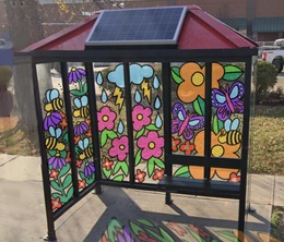 a decorated bus stop is pictured
