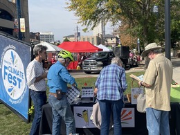 attendees at the EV event are pictured