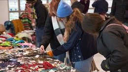 shoppers at the Holiday Market are pictured