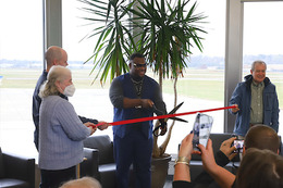 Bruce Teague and Airport Commission members at ribbon cutting