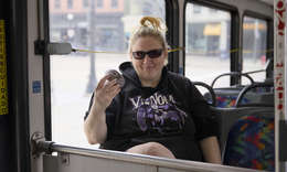 bus rider with donut