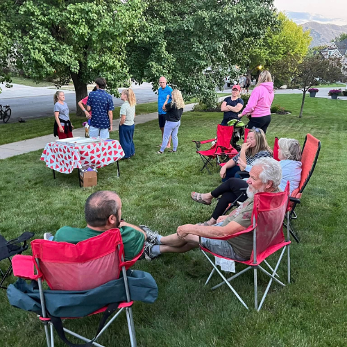 OutAbout event in Draper, Utah shows neighbors congregating on a lawn