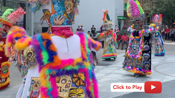 People dance at the Iowa City Latino Festival. 