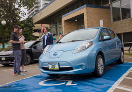 Drive Electric event participants are pictured