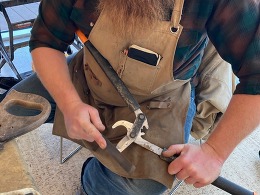 hands repairing a tool