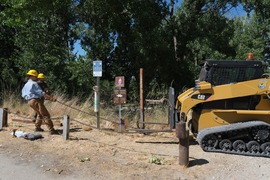 Volunteers pulling a machine