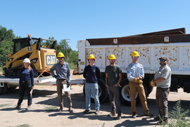 Volunteers wearing hard hats