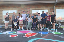 Photo of volunteers standing on a sensory walk.