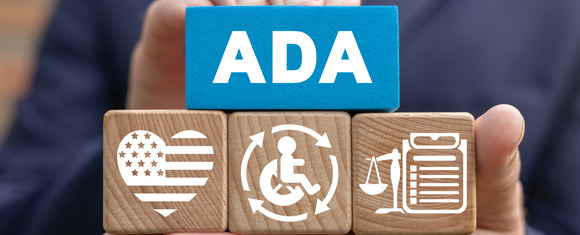 Adobe Stock image that shows hand holds wooden blocks with ADA written on a blue block above icons