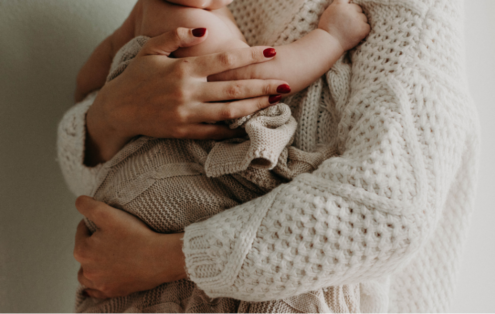 Mother holding a baby