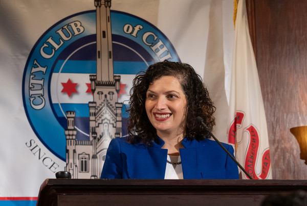 Photo of Rachel, the City of Chicago Commissioner of the Mayor's Office for People with Disabilities, speaking at a podium.