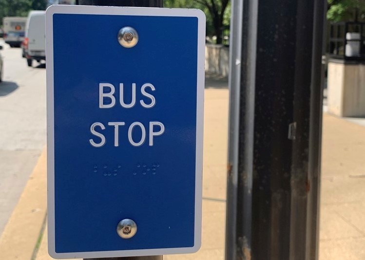 Tacticle sign at bus stop