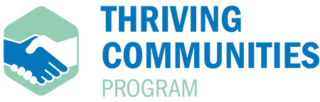 Logo: Thriving Communities Program text to the right of icon featuring blue and white hands shaking on a green hexagon