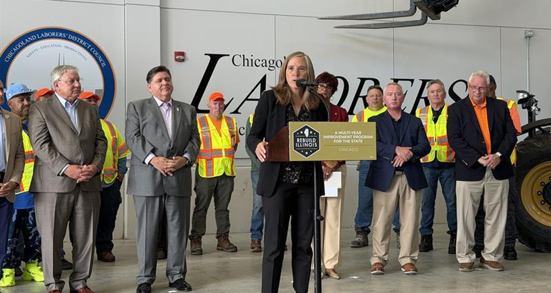 IDOT Secretary Gia Biagi addressing the press