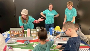 Kids engaging in safety activity at Chicago engineering fest