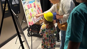 Kids engaging in safety activity at Chicago engineering fest