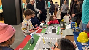 Kids engaging in safety activity at Chicago engineering fest