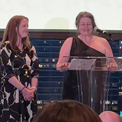 CMAP staff member speaking at WTS award night