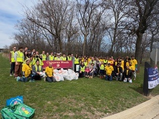 Dozens of volunteers gathered at Axehead Lake during the Earth Month Clean Up on April 11