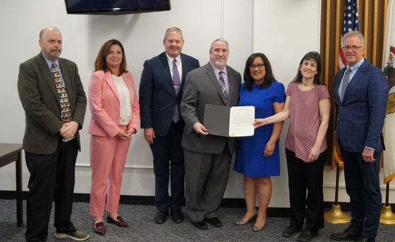 Pro Bono and Legal Aid Groups receive a proclamation from DuPage County
