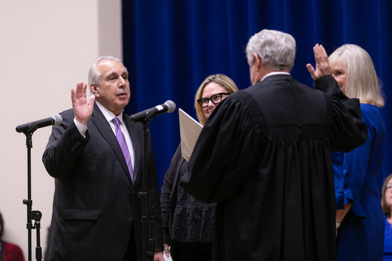 Sam Tornatore takes the oath of office for County Board member.