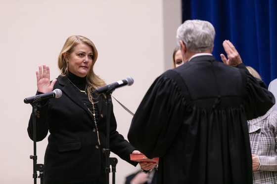 Dawn DeSart takes the oath of office for County Board member.