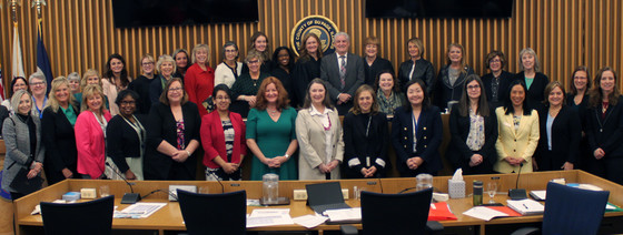 Female staff and elected officials celebrating Women's History Month