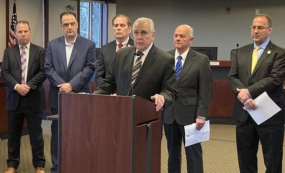 Sam Tornatore speaks at a news conference about the railroad merger.