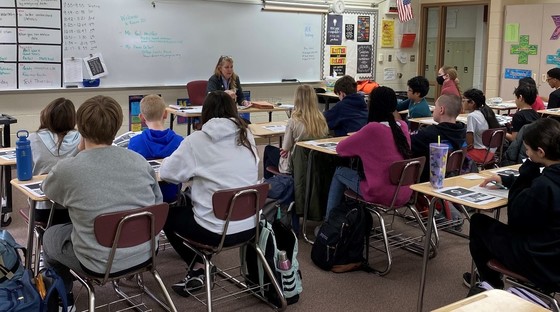 Dawn DeSart addresses students in a 7th grade class