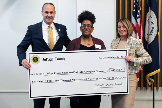 Small nonprofit grant recipients check presentation