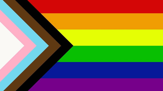 LGBTQIA Pride Flag, including chevron for Black, Brown, and Trans individuals