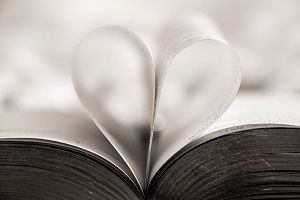 illustration of a book with a heart made from the pages