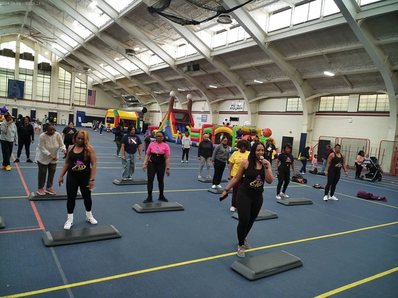 Group of people working out at the 2025 "We're Out Walking" kickoff event.