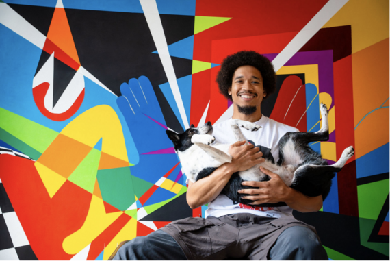 African American man with dog