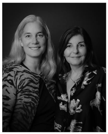 Two Women Next to Each Other