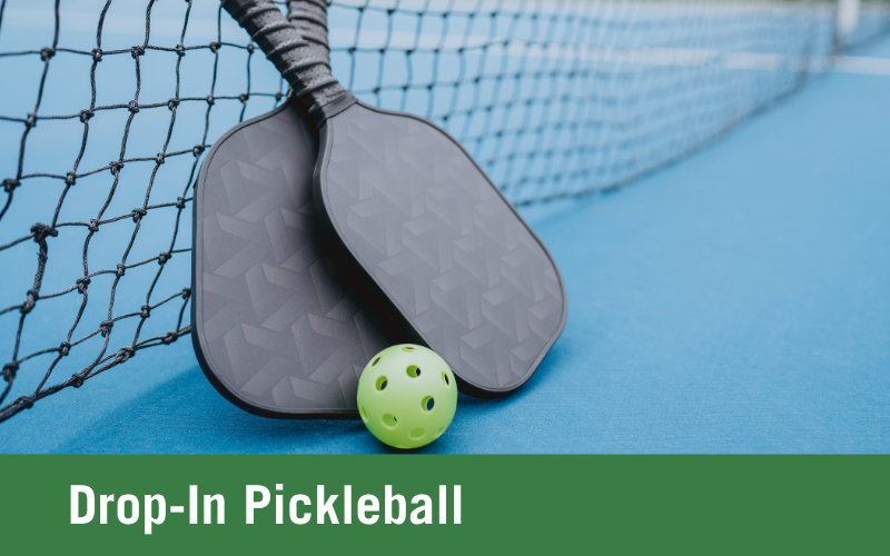 Pickleball equipment on a pickleball court with the words "Drop-In Pickleball"