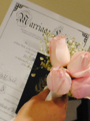 Marriage license and flowers