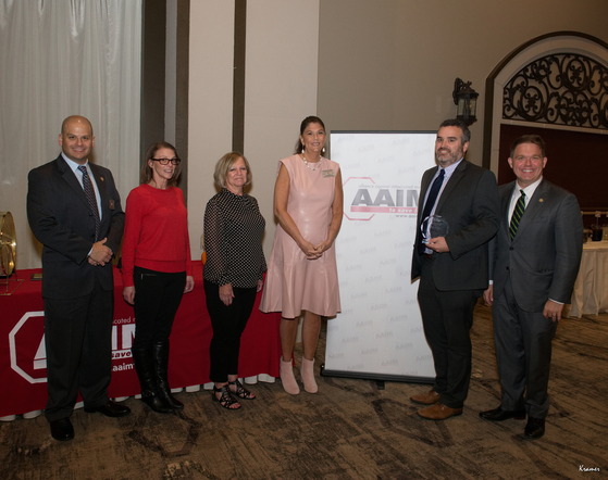 Photo of 6 people in formal attire