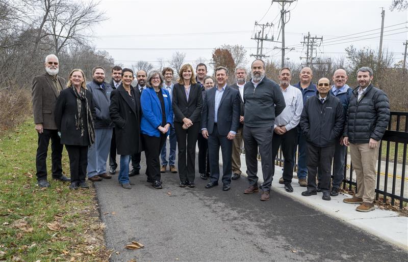 Officials on the new path connecting the intersection to the Robert McClory Bike Path