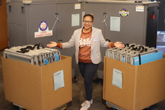 Clerk Waters with early voting machines at Village Hall