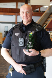 Officer Mike Kelly with employee service recognition award