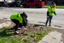 Volunteers pick up refuse during the 2024 Spring Neighborhood Cleanup event