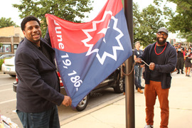 Juneteenth flag-raising 2024 Trustee Cory J. Wesley and Trustee Chibuike Enyia