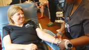 Public Health Nurse Kitty Monty donates blood