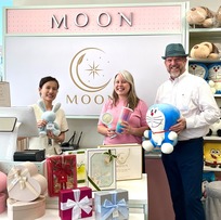 Moon's Gifts owner Summer Chen with Oak Park Development Services Director Emily Egan and Economic Vitality Administrator Cameron Davis