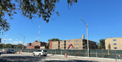 Fence around Pete's Fresh Market construction site on Madison Street